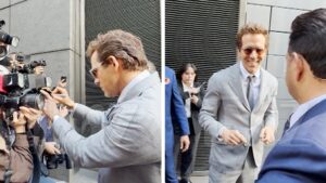 Ryan Reynolds CHOCA: Finge assinar câmeras de paparazzi em novo escândalo!